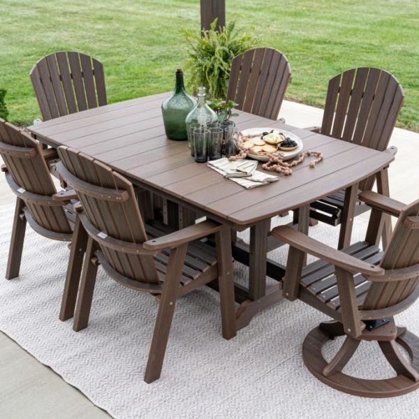 Garden Classic 44” x 72” Rectangular Dining Table in Brazilian Walnut. Comfo Back Dining Chairs and Comfo Back Swivel Rocker Dining Chairs in Brazilian Walnut