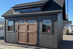 Manor with mini dormer black brown doors